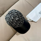 Dior cap with black brim and black-and-white monogram print, side view