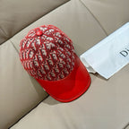 Red Dior monogram cap with curved brim and round red top button
