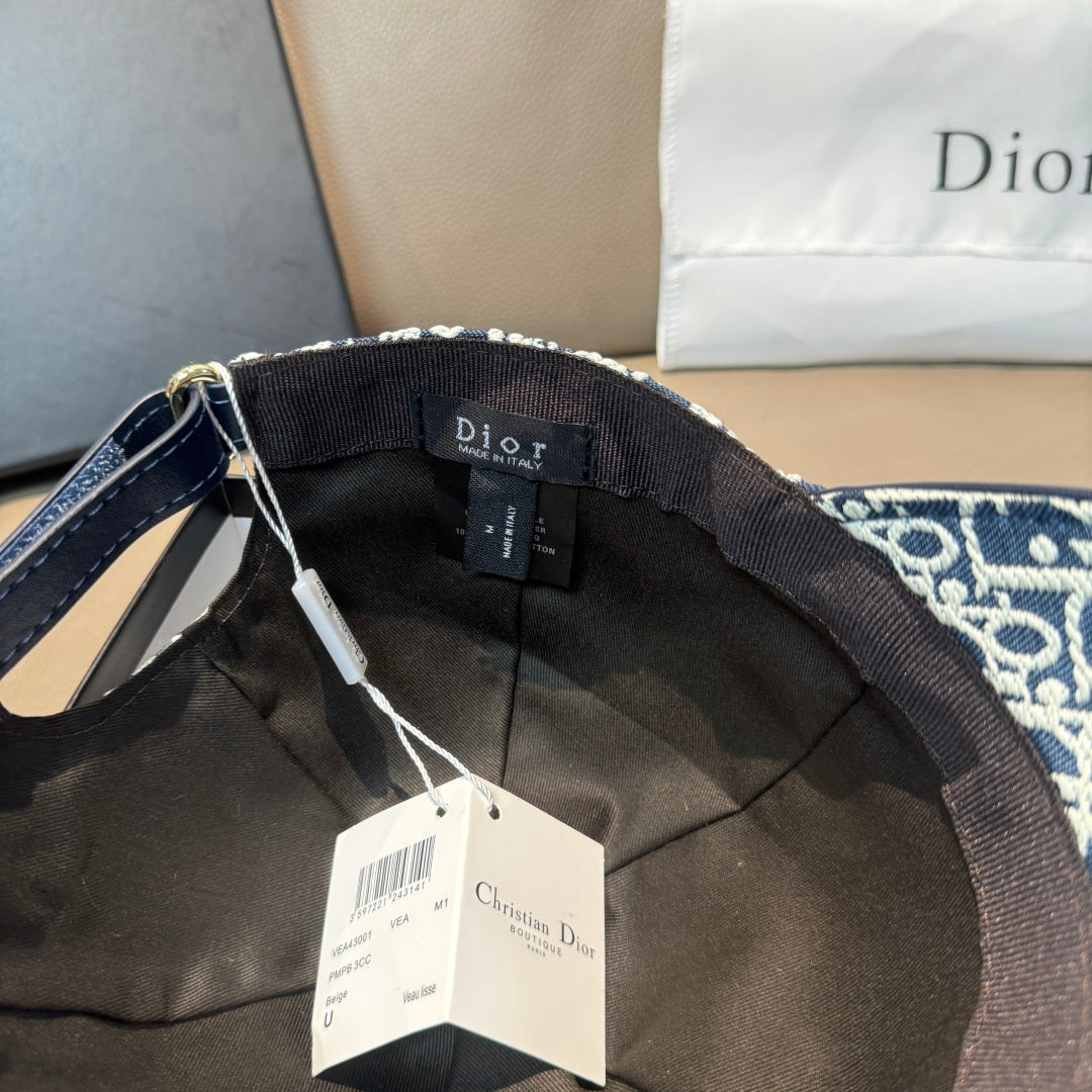 Baseball cap interior view with adjustable strap and Dior logo patch; black lining.