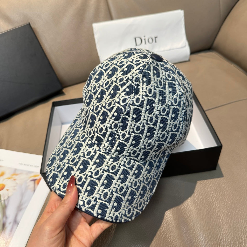 Navy logo baseball cap with white pattern, curved brim, front 3/4 view.