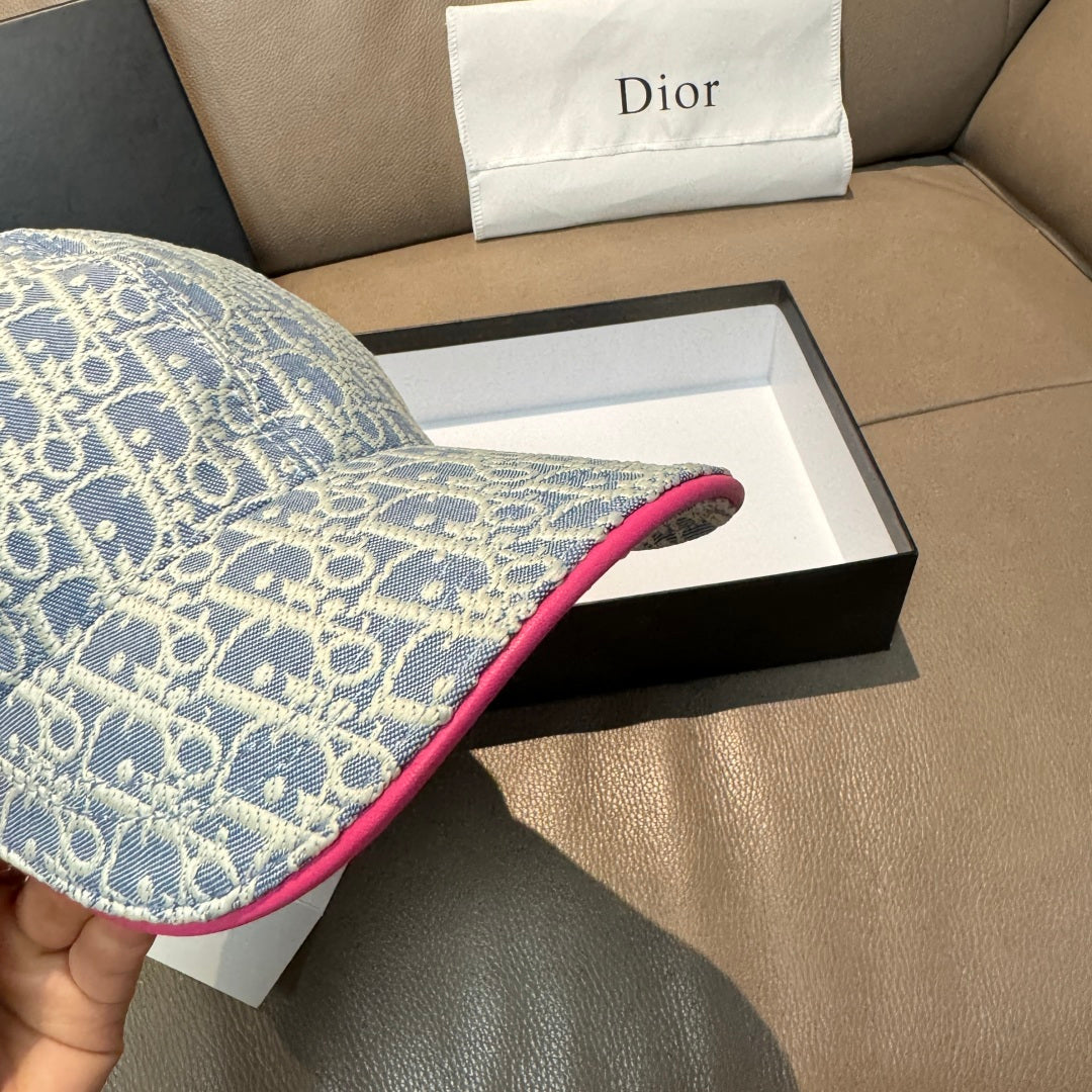 Light blue monogram cap brim with pink underside trim detail