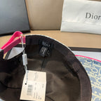 Inside view of monogram baseball cap with black lining and hanging tags