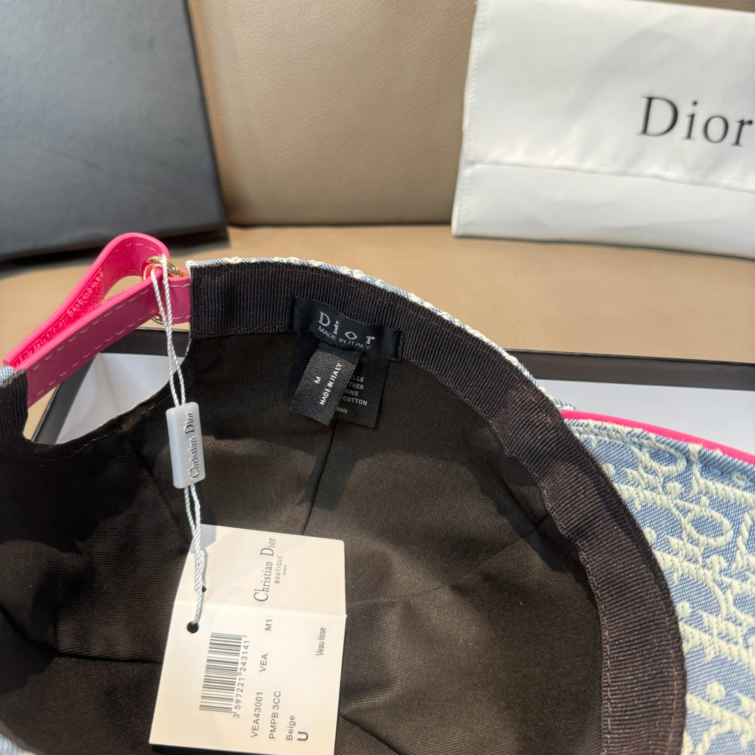 Inside view of monogram baseball cap with black lining and hanging tags