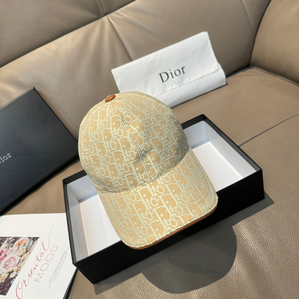 Beige Dior monogram baseball cap with curved brim and brown button on top