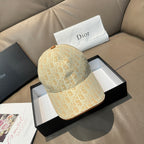 Beige Dior monogram baseball cap with curved brim and brown button on top