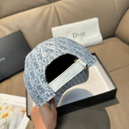 Light blue baseball cap with adjustable strap opening and white leather tab.