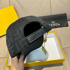 Black Fendi baseball cap showing interior lining and adjustable strap