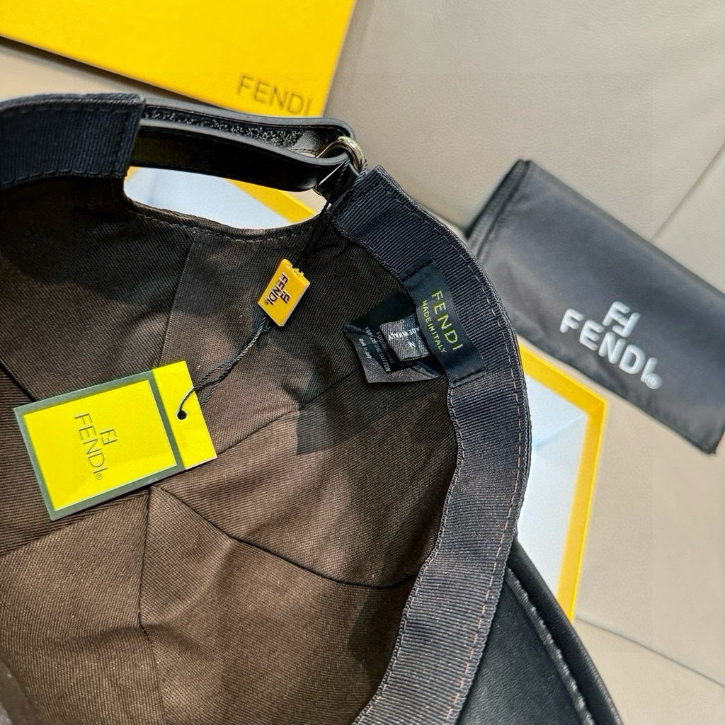 Black Fendi cap with fabric strap and attached hang tags