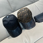 Two baseball caps: black monogram cap and brown FF monogram cap