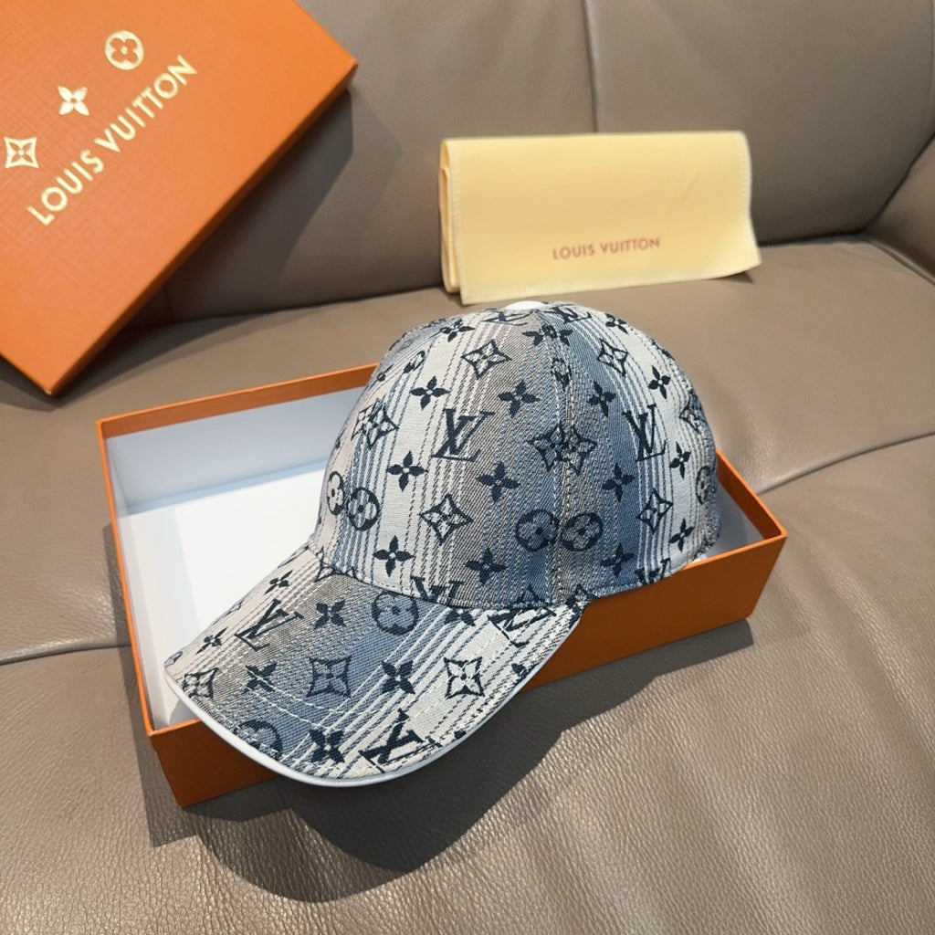 Louis Vuitton denim-blue cap with curved brim and monogram pattern