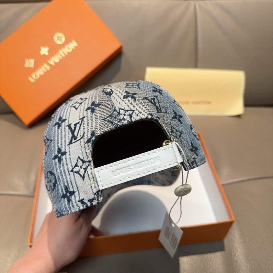 Louis Vuitton denim-blue cap back with white strap and monogram print
