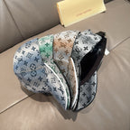 Louis Vuitton monogram baseball cap, light blue with green trim, side strap profile