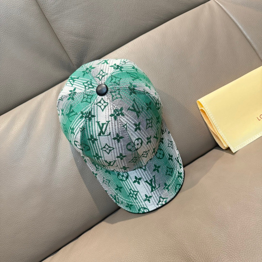 Louis Vuitton baseball cap with green monogram print and dark adjustable strap button