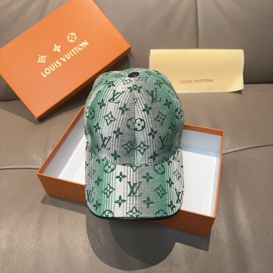Louis Vuitton baseball cap in green with white monogram pattern and curved brim