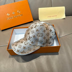 Louis Vuitton monogram baseball cap, light blue and brown, front view with brim