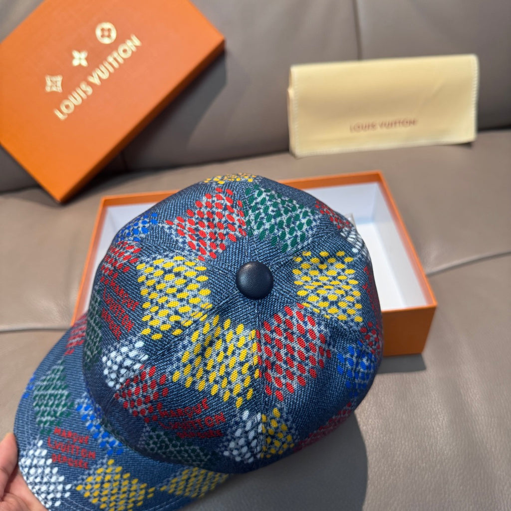 Multicolor patchwork baseball cap close-up, blue fabric with colorful block pattern