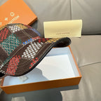 Patchwork cap side view with brim stitching and hanging label area