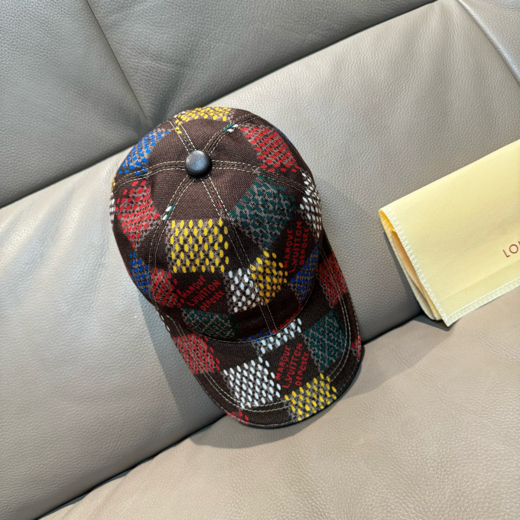 Plaid patchwork cap with dome top and black button detail