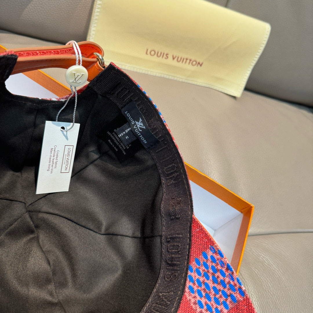 Louis Vuitton cap with black interior, multicolor brim, hanging tags and strap