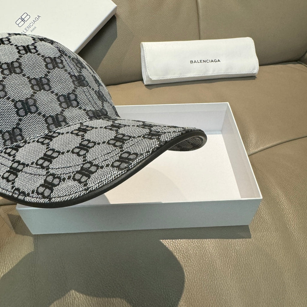 Monogram baseball cap with curved brim, side profile and textured patterned fabric