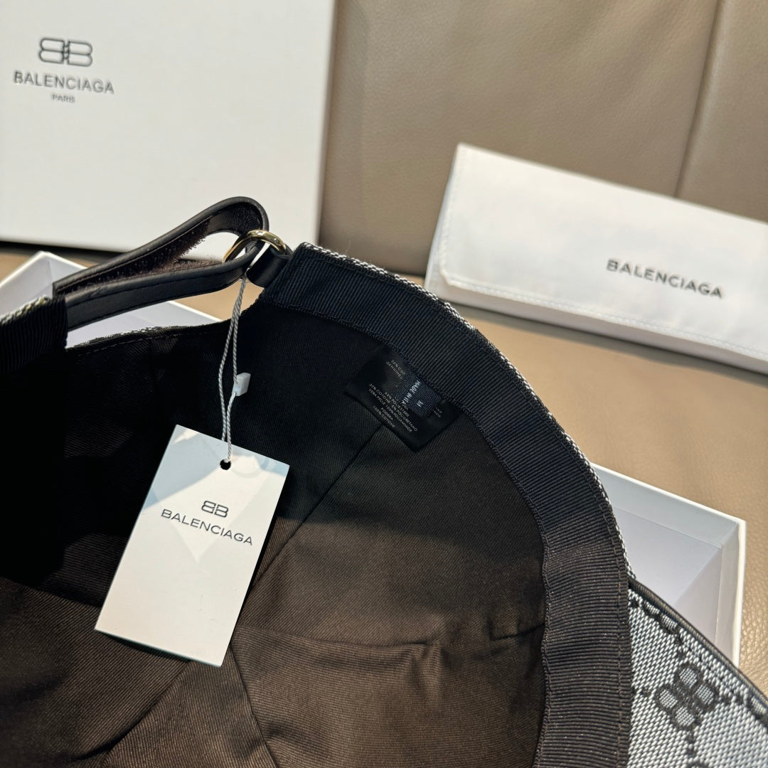 Balenciaga cap interior view with black lining and adjustable strap on the side.