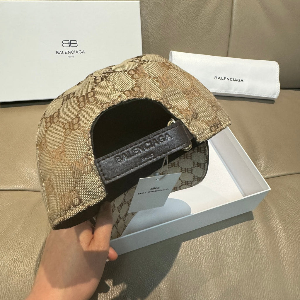 Monogram baseball cap back with adjustable strap and dark logo patch, tan pattern