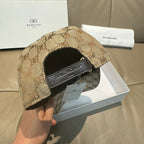 Monogram baseball cap back with adjustable strap and dark logo patch, tan pattern