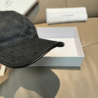 Black monogram baseball cap with curved brim and side seam details