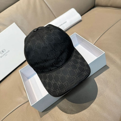 Balenciaga cap in dark monogram fabric with curved brim and stitched panels