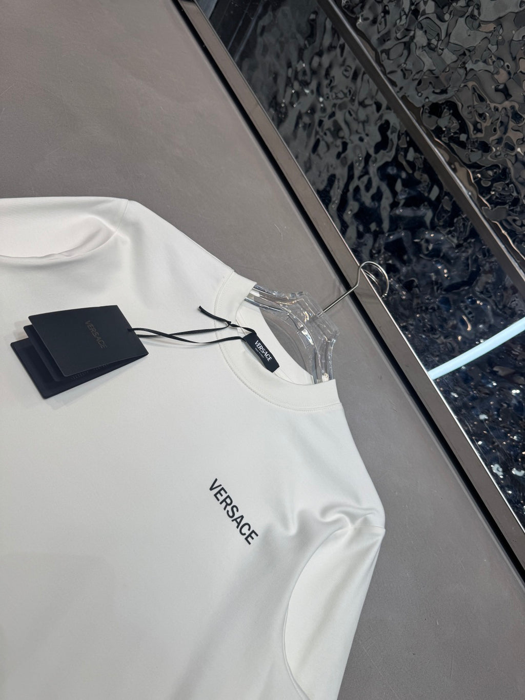 White Versace long-sleeve T-shirt with sleeve logo and hang tag