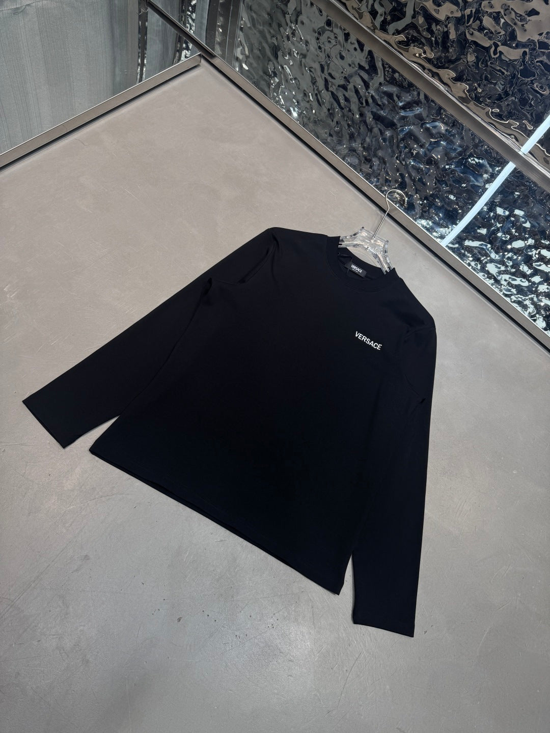 Dark Versace long-sleeve T-shirt with small chest logo