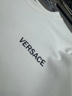 White Versace long-sleeve T-shirt with VERSACE logo printed on chest
