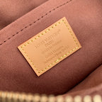 Louis Vuitton interior fabric label with tan stitched border on pink-brown lining