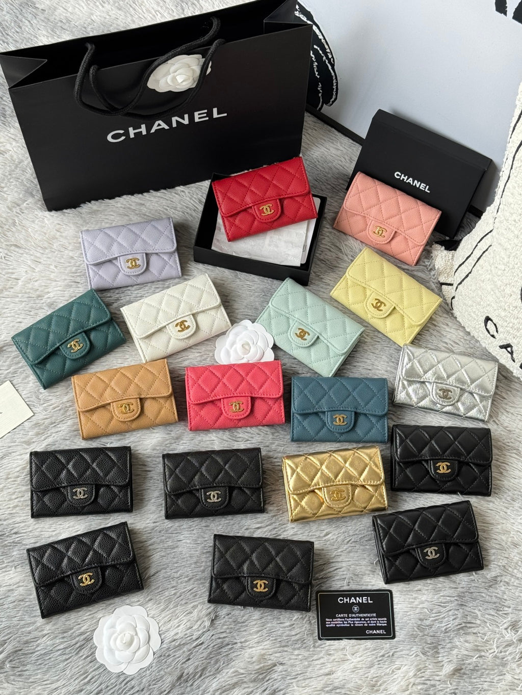Quilted flap small bags in assorted colors: white, red, pink, yellow, and teal