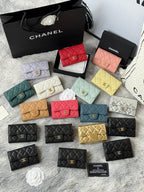 Quilted flap small bags in assorted colors: white, red, pink, yellow, and teal