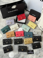 Quilted flap small bags in assorted colors: red, peach, lavender, mint, and black