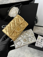 Gold quilted flap small bag with gold logo clasp and chain strap