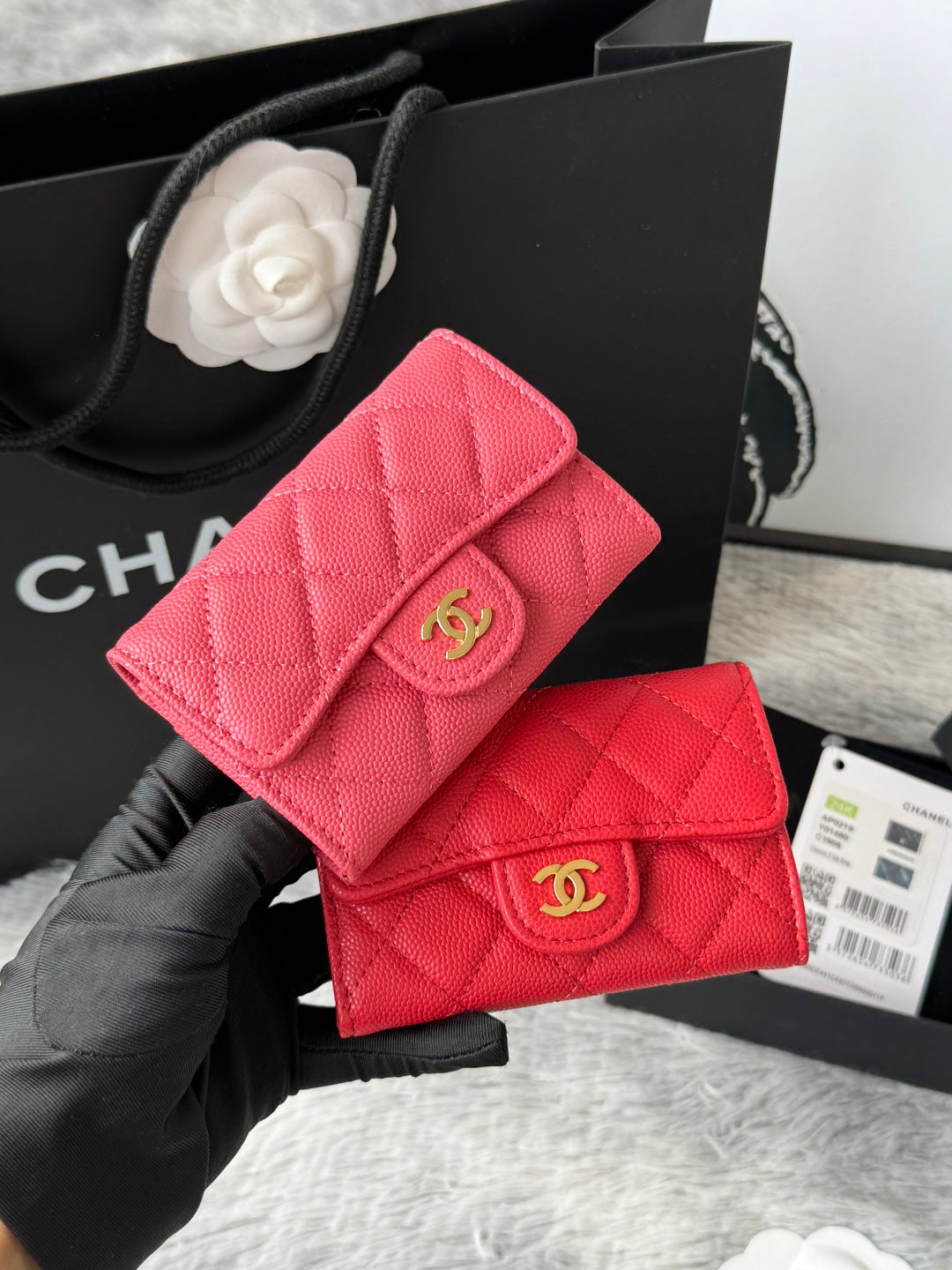 Pink quilted flap small bag with gold logo clasp and chain strap