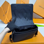 Louis Vuitton dark blue crossbody bag open view with top interior lining and zipper.
