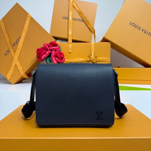 Men’s navy textured leather crossbody bag with flap and LV logo on front.