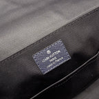 Men's Louis Vuitton bag interior label patch on dark lining fabric