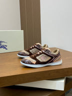 Burberry lace-up sneakers, side view, with brown and beige uppers and white midsole