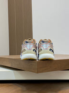 Burberry sneakers with blue uppers and multicolor details, showing heel and back