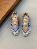 Burberry lace-up sneakers in blue with multicolor accents and patterned panels