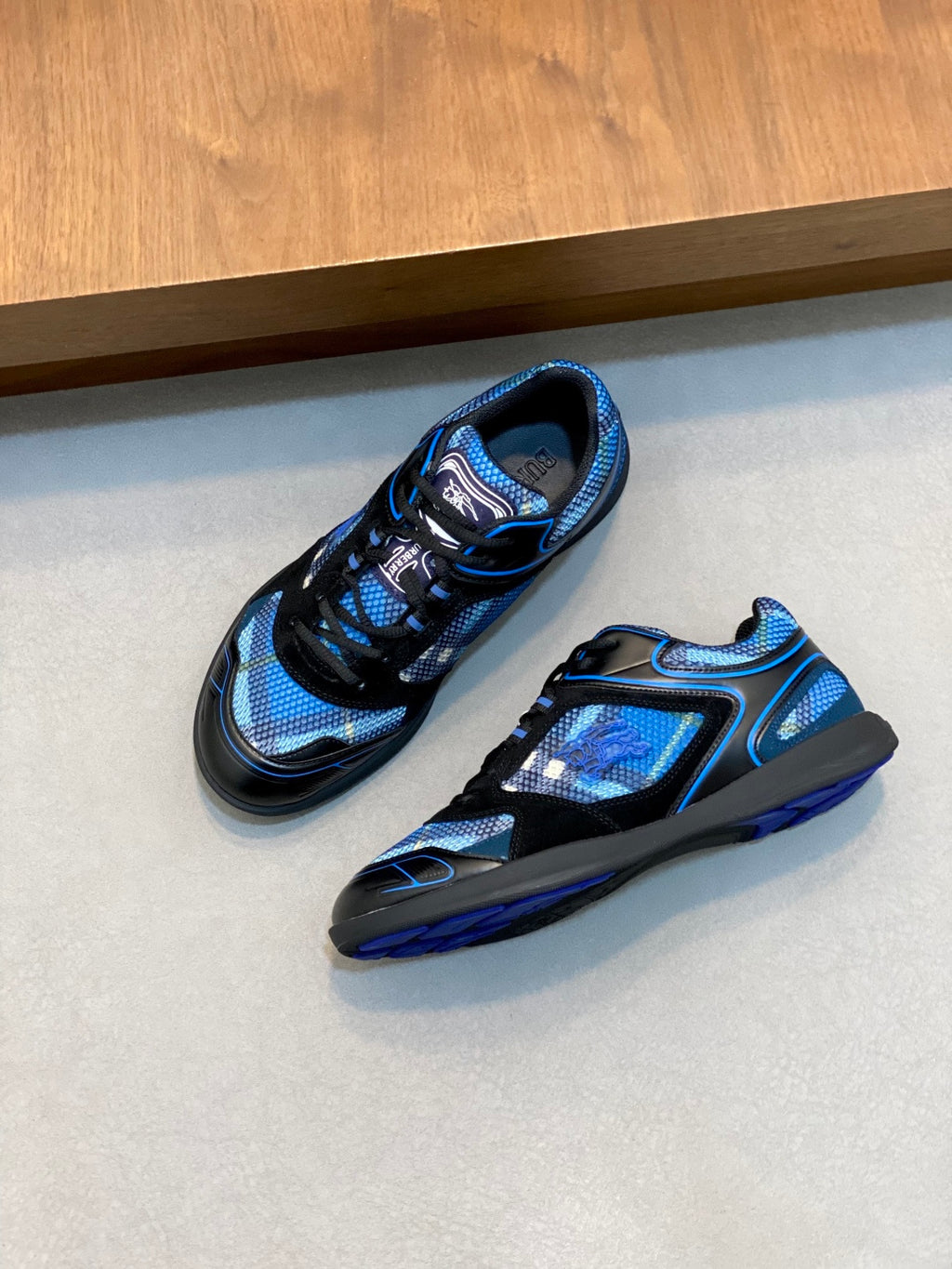 Pair of blue and black lace-up sneakers with mesh upper and padded tongue, Burberry