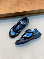 Burberry blue-and-black low-top sneakers, paired on light surface