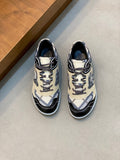 Burberry low-top sneakers, beige and navy check fabric, black toe cap, lace-up