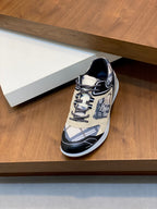 Single low-top lace-up sneaker in beige and navy on display shelf