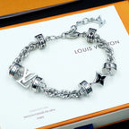 Silver logo charm bracelet with star beads and chain links