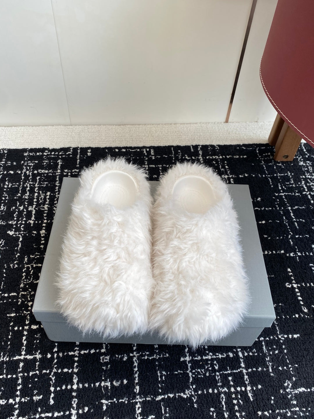 White faux-fur slip-on sandals with open toe and wide, fluffy upper